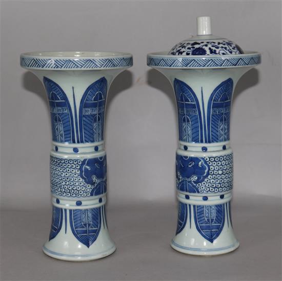 A pair of Chinese blue & white vases and a similar, cover or funnel